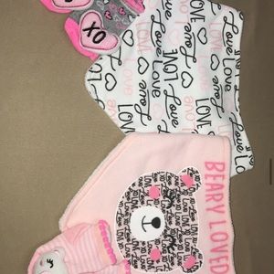 7 bibs(great condition) 2 pairs of Themed socks and 2 pairs of mittens